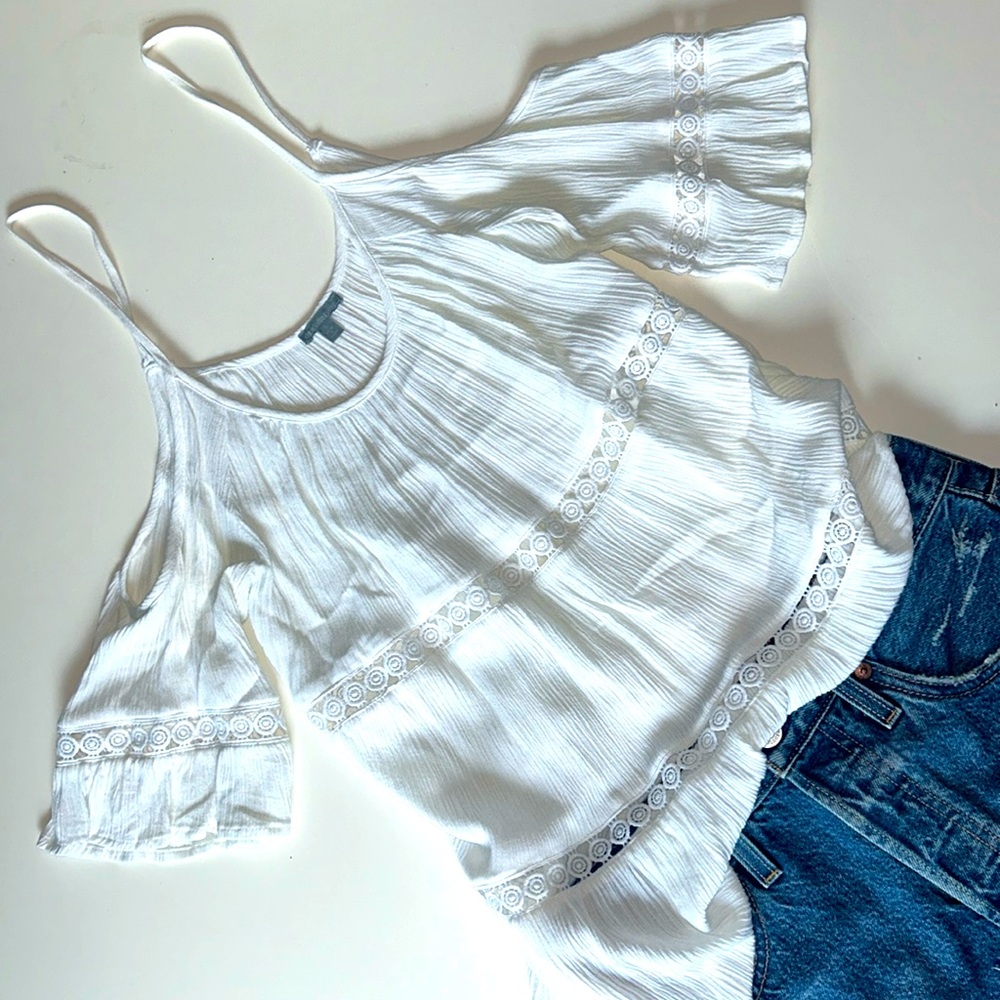 Flowy cold shoulder crochet detail top